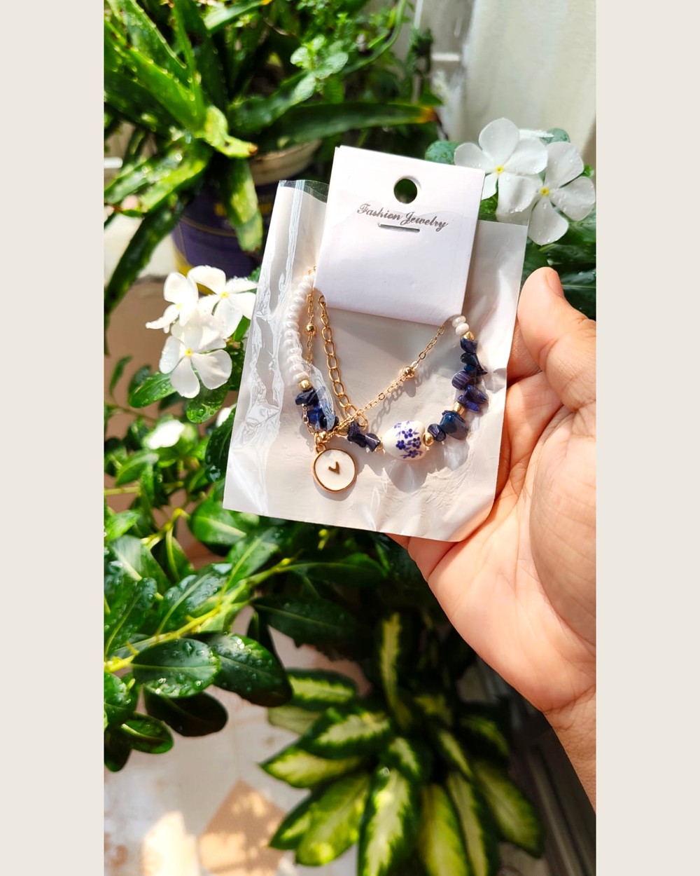Layered gold-tone bracelet with pearl beads and lapis-blue stone chips — Sira Elegance