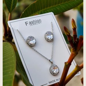 Round crystal halo pendant necklace with matching stud earrings, silver-tone set — Sira Elegance