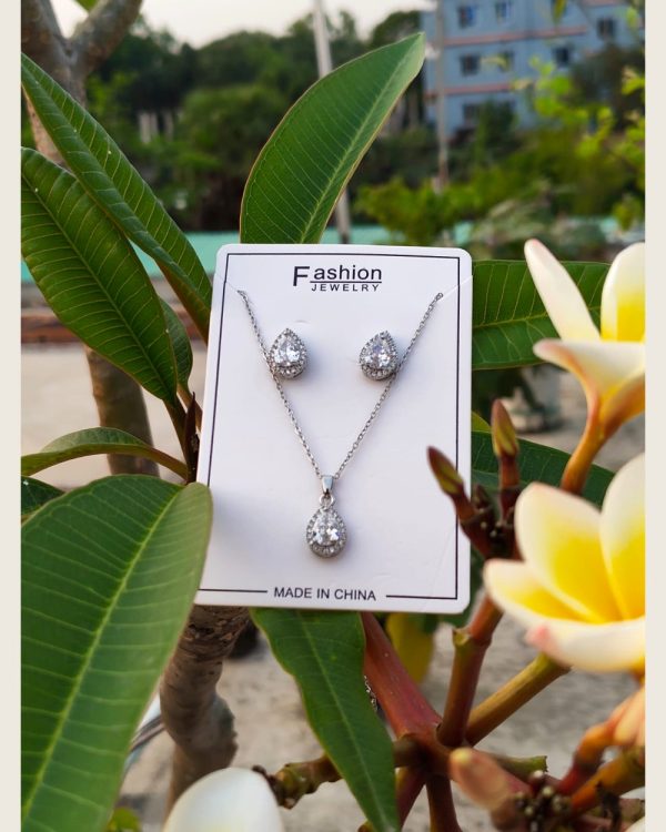 Clear crystal teardrop pendant necklace with matching earrings, silver-tone set — Sira Elegance